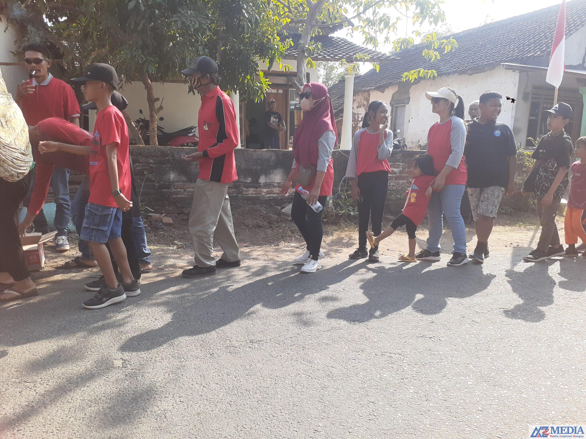 20230827 081730 scaled Lagi lagi desa Tarokan Gelar acara jalan santai dan senam sehat dengan bagikan kupon gratis.